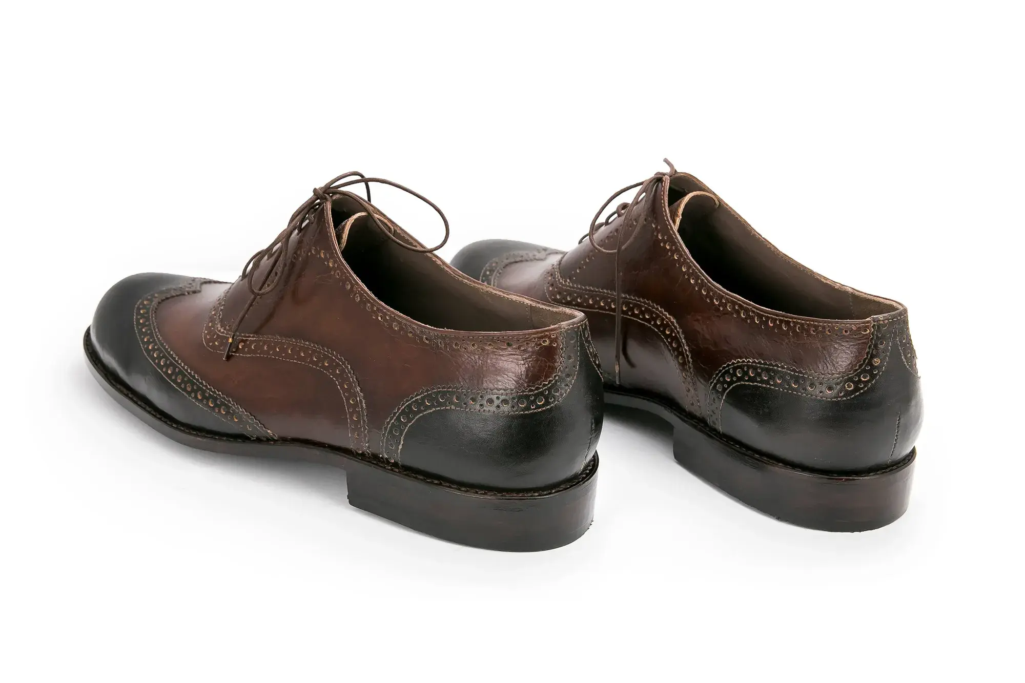 Brown and Black Brogues, seen from behind at an angle