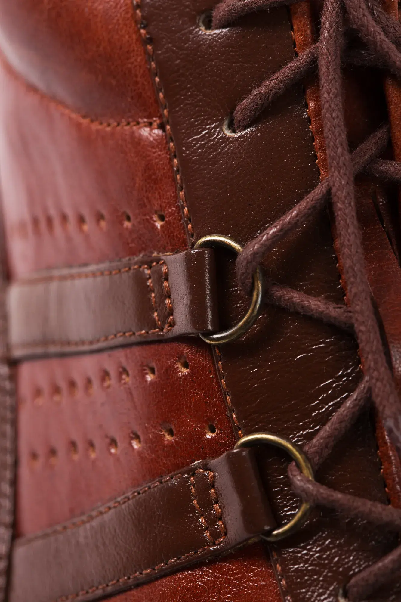 Buckle detail of a chestnut lace-up