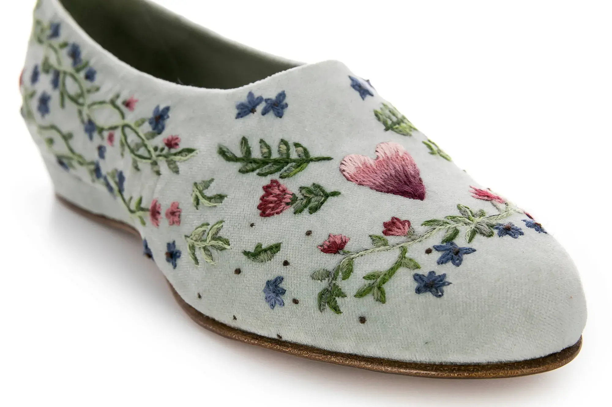 Close-up of a floral embroidered flat