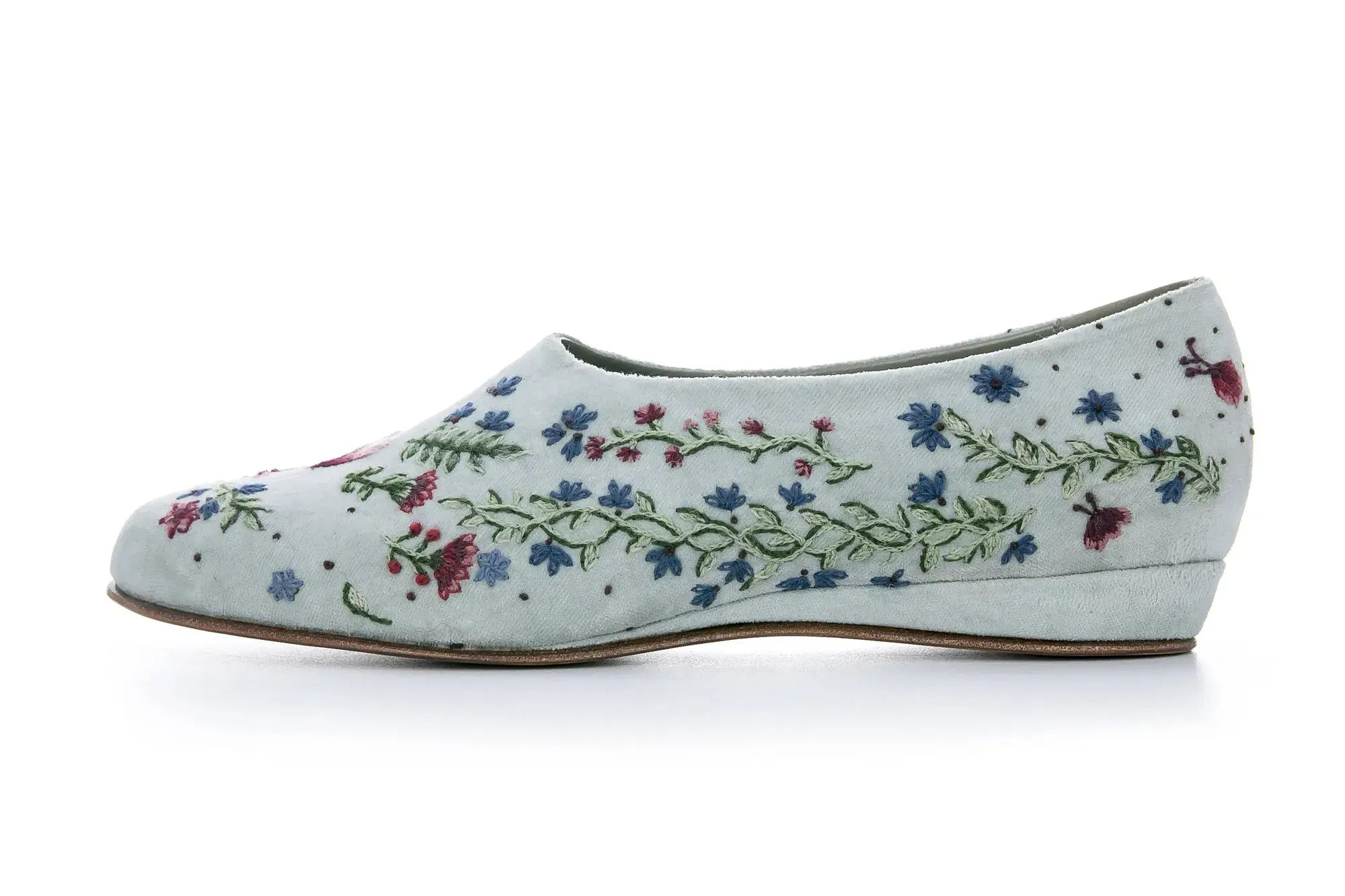 A floral embroidered flat in profile
