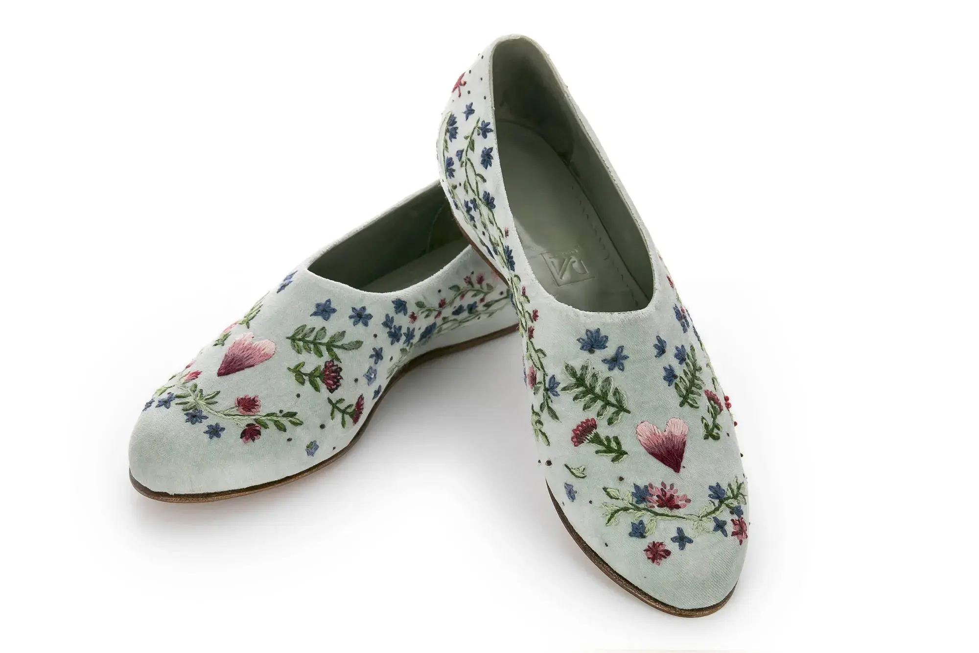 Floral Embroidered Flats, one resting across the other