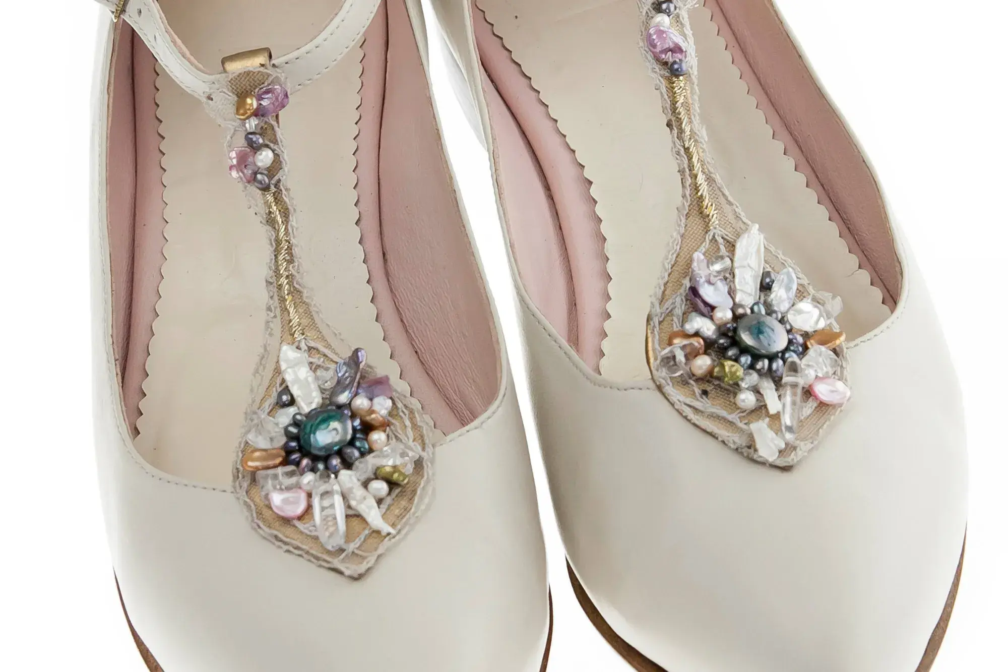 Close-up of an ivory jewelled T-bar