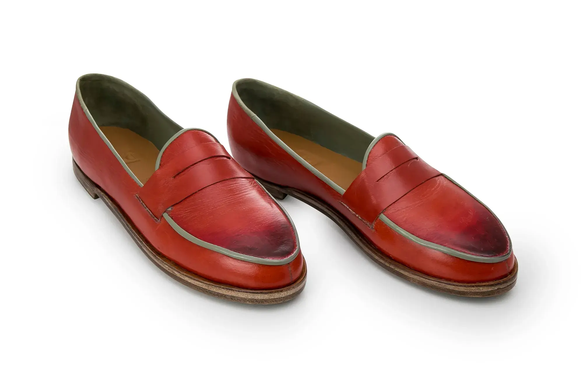 Red Penny Loafers, seen from the front at an angle