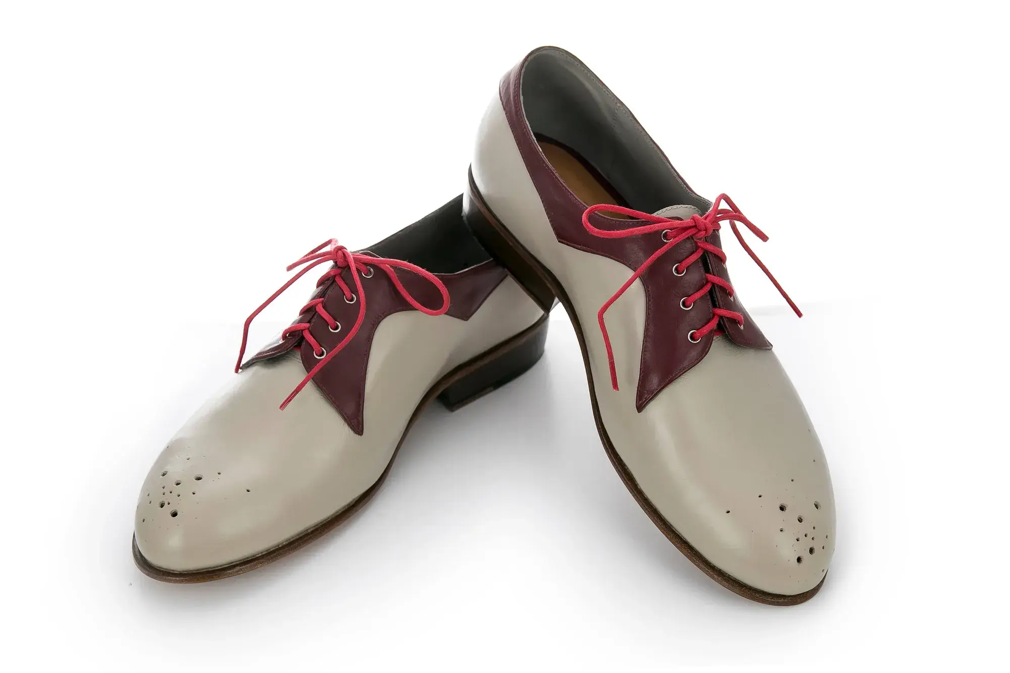 Stone and Burgundy Derbies, seen from the front at an angle
