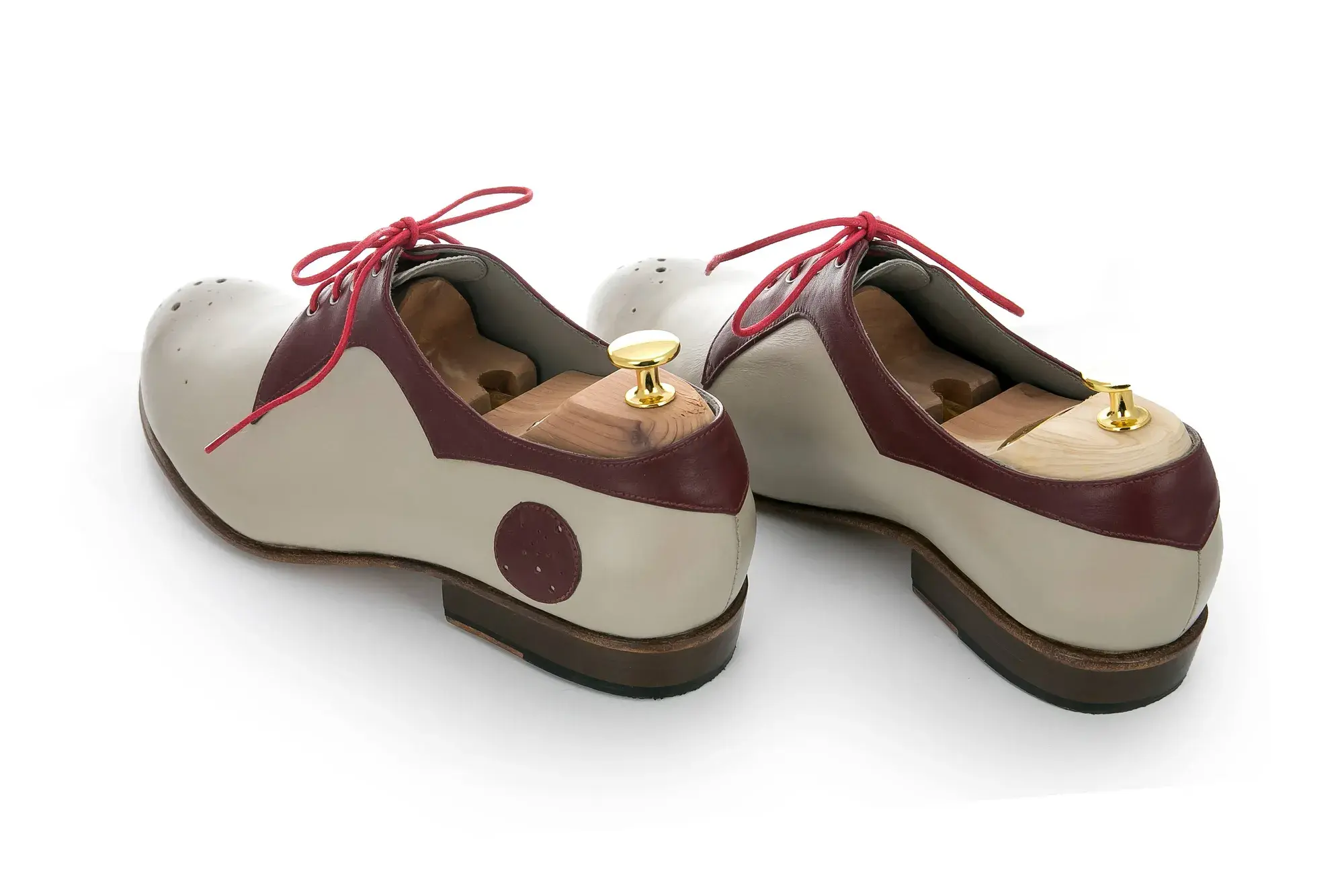 Stone and Burgundy Derbies, seen from behind