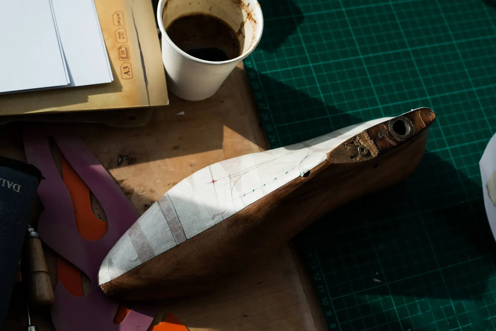 The last on the bench with the tape shell half peeled away